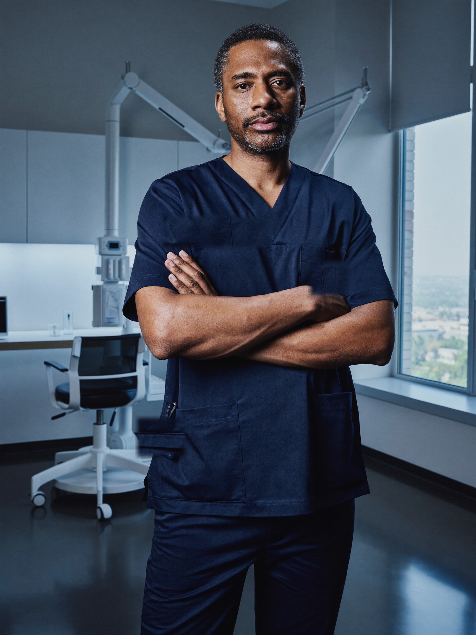 A board-certified facial-plastic surgeon in a discreet, modern consultation suite